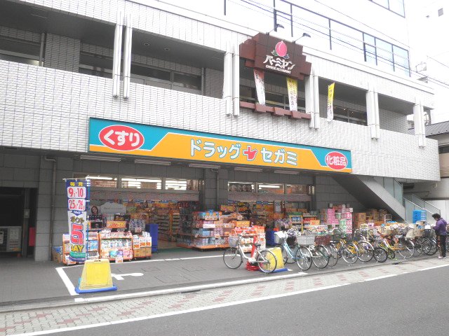 K.MONARCH ドラッグストア：ﾄﾞﾗｯｸﾞｾｶﾞﾐ青戸店　450m