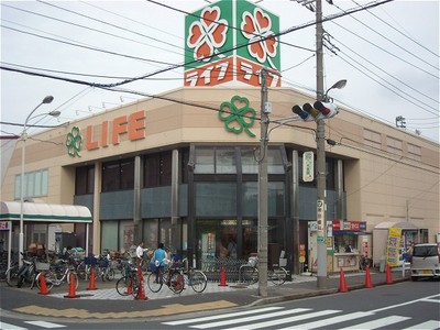 I'll スーパー：ライフ 竹の塚店　1062m